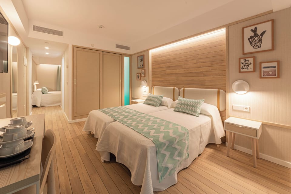 Family Room, Terrace, Pool View | Desk, blackout drapes, soundproofing, free WiFi