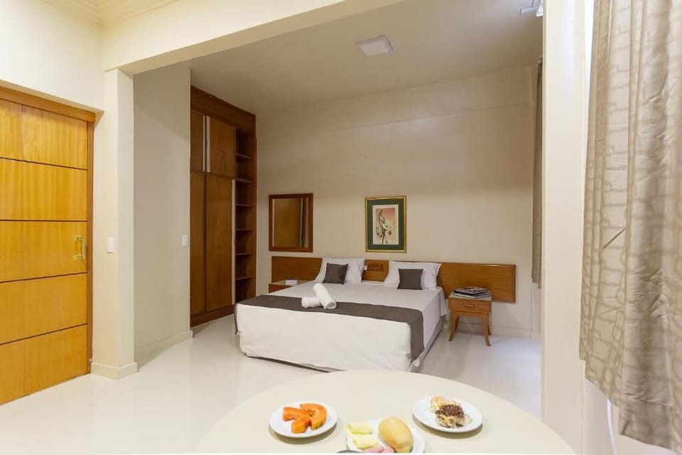 Executive Double Room | Minibar, desk, bed sheets