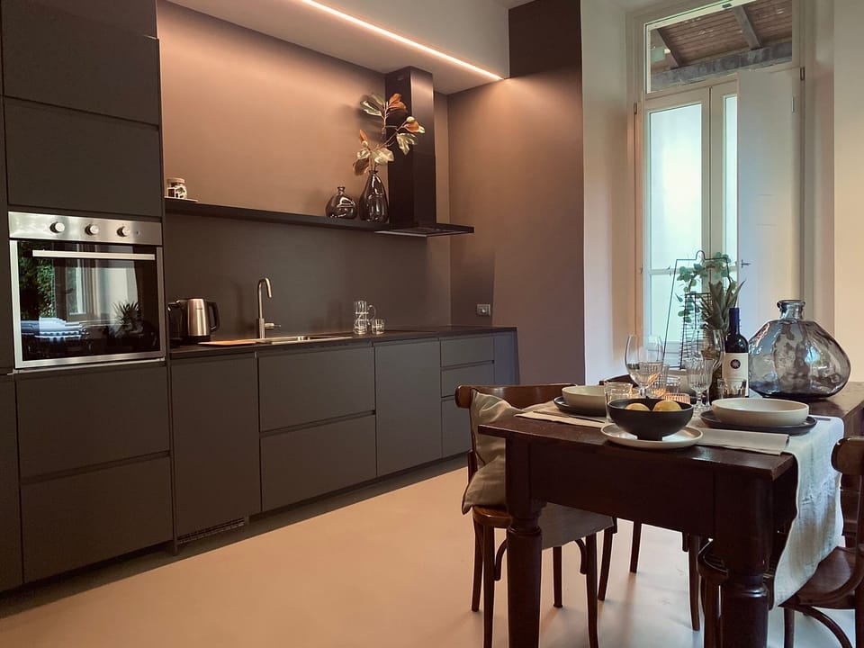 Apartment, Garden View | Private kitchen | Electric kettle, eco-friendly cleaning products