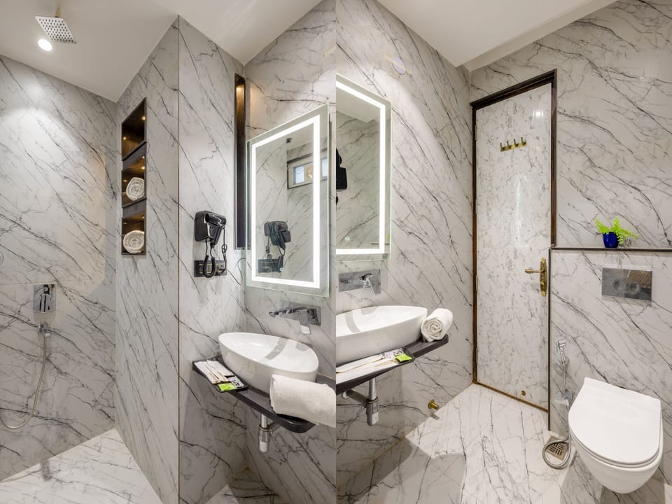 Shower, free toiletries, hair dryer, slippers