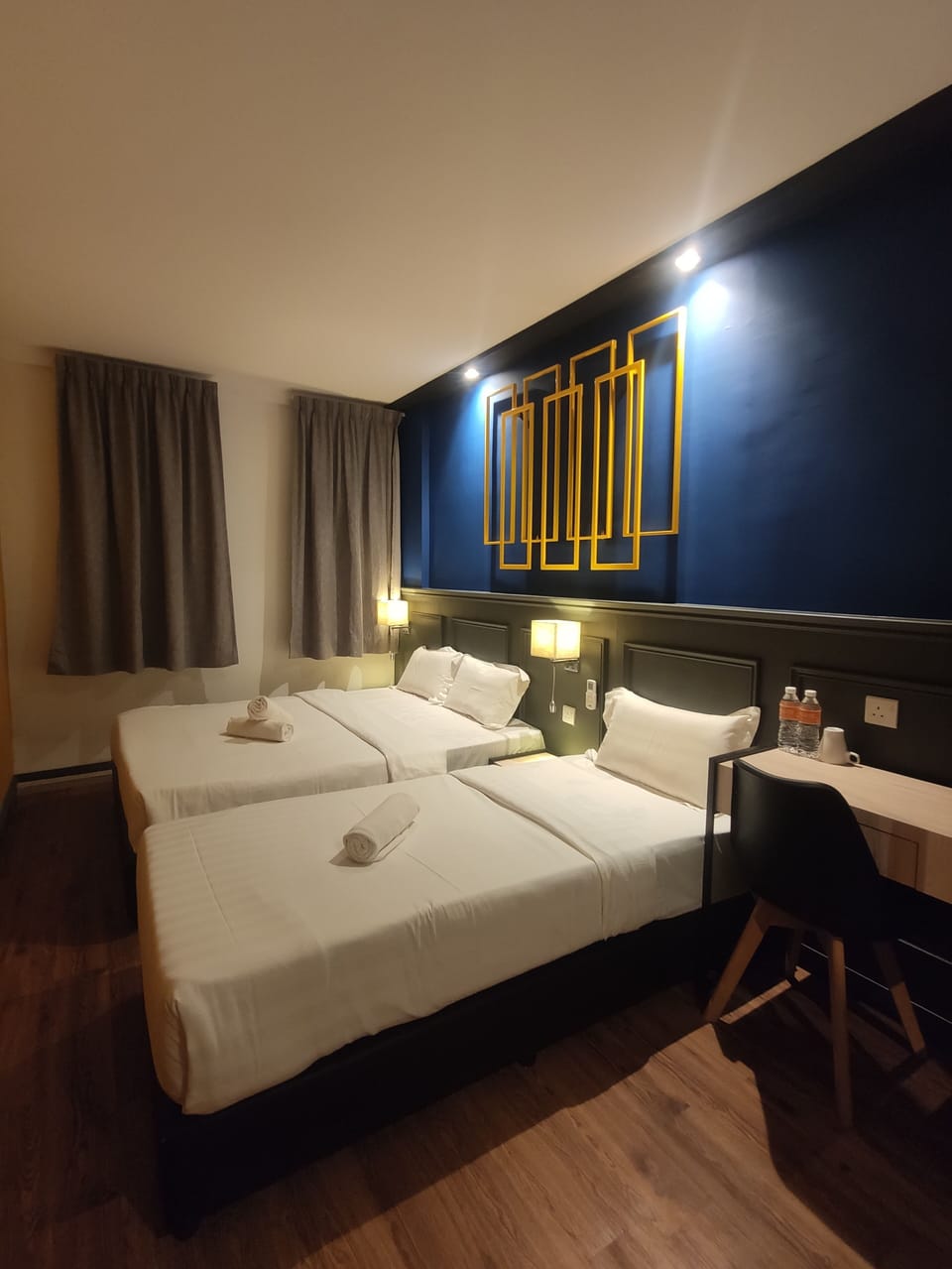 Family Room | Desk, bed sheets