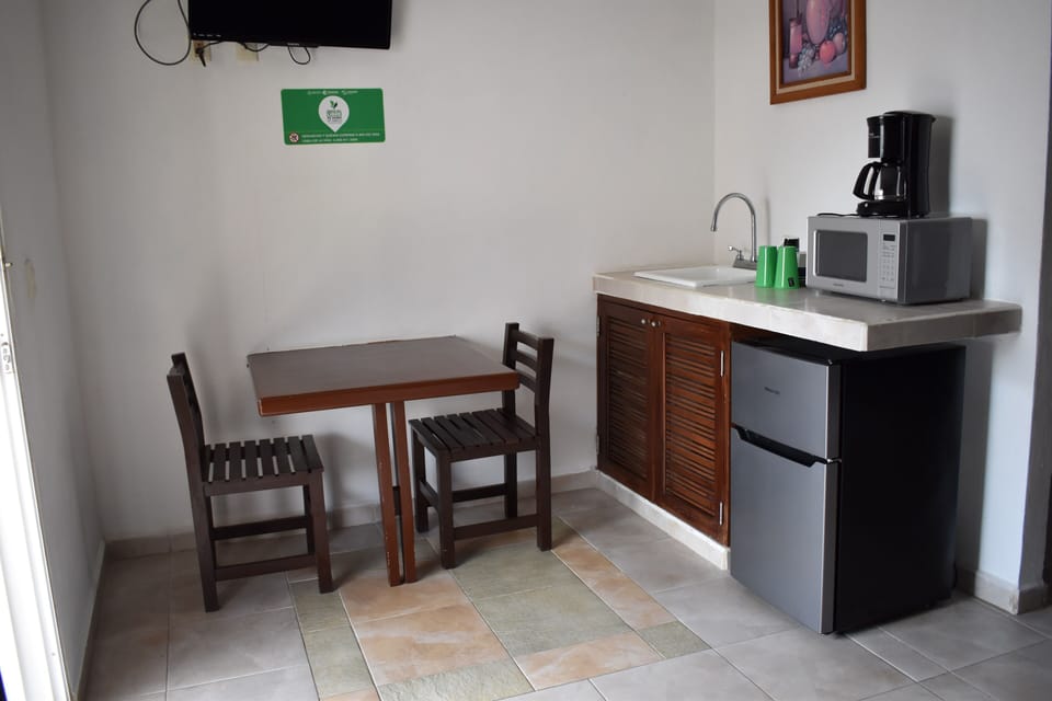 Superior Room, 2 Double Beds | Living area | 20-cm TV with cable channels