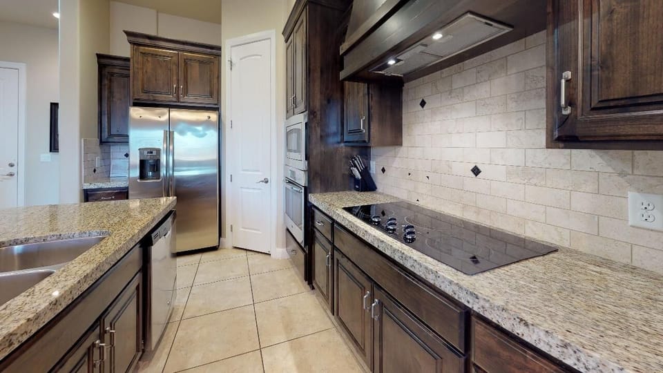 Townhome, 4 Bedrooms | Private kitchen | Coffee/tea maker, fridge, oven, toaster