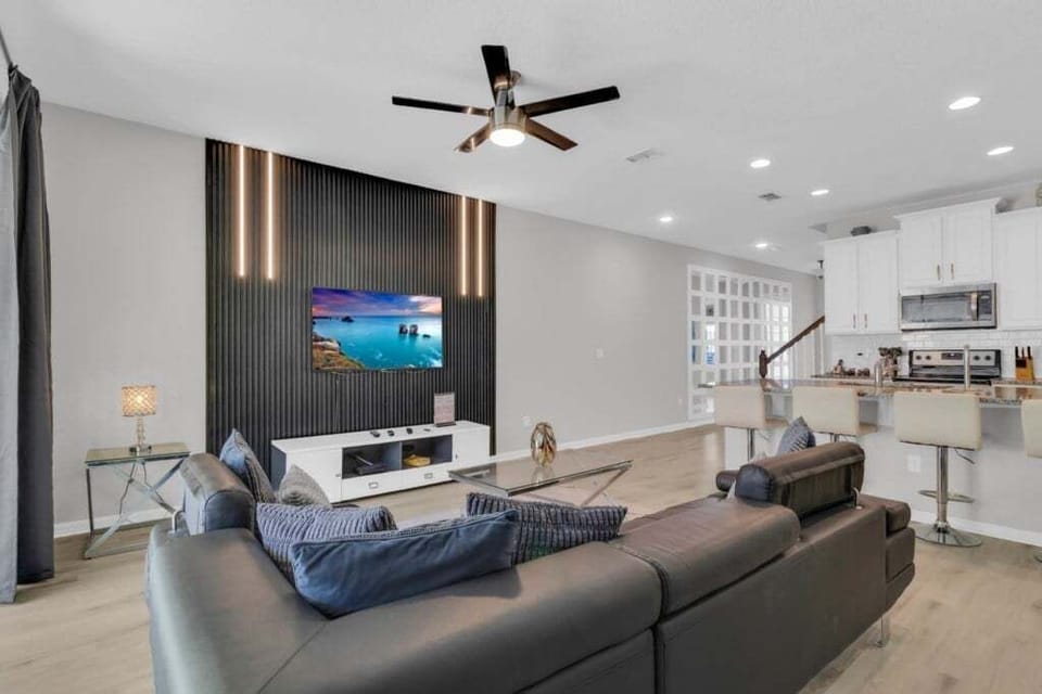 Townhome, 5 Bedrooms | Living area | 30-inch TV with cable channels