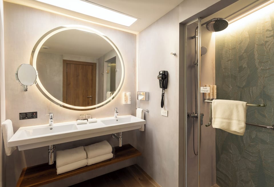 Shower, rainfall showerhead, eco-friendly toiletries, hair dryer