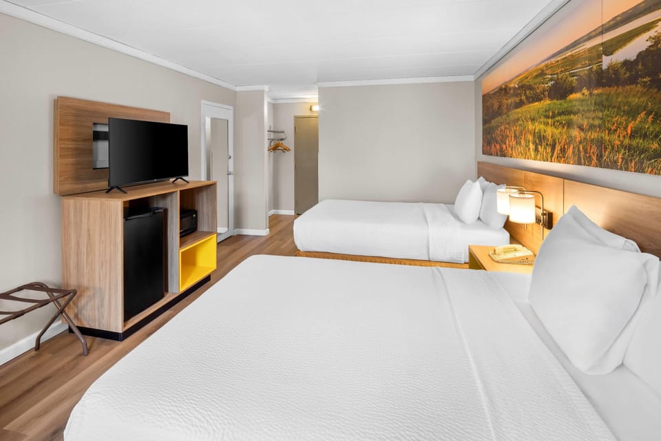Room, 2 Double Beds | Desk, laptop workspace, blackout drapes, iron/ironing board
