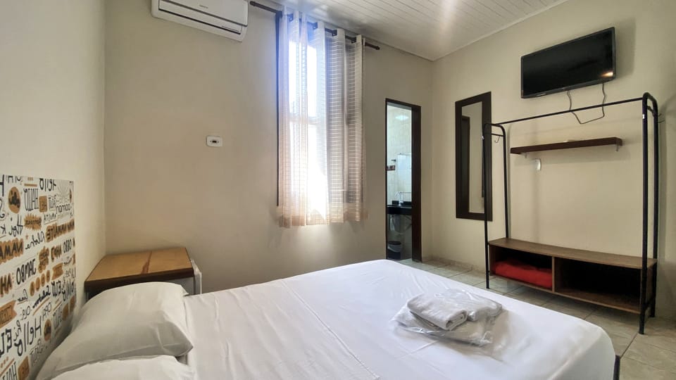 Suite casal standard | Blackout drapes, free WiFi, bed sheets