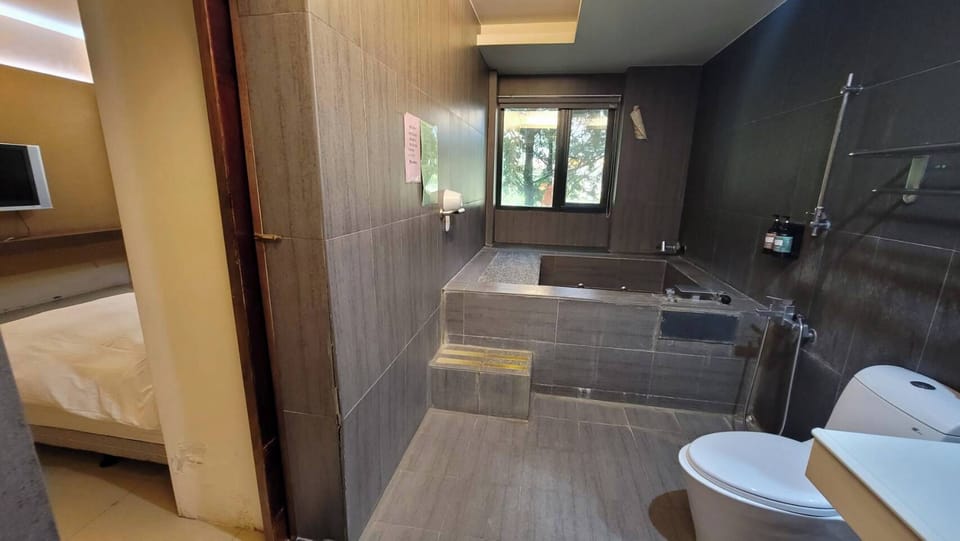 Business Double Room | Bathroom | Separate tub and shower, spring water tub, free toiletries, hair dryer