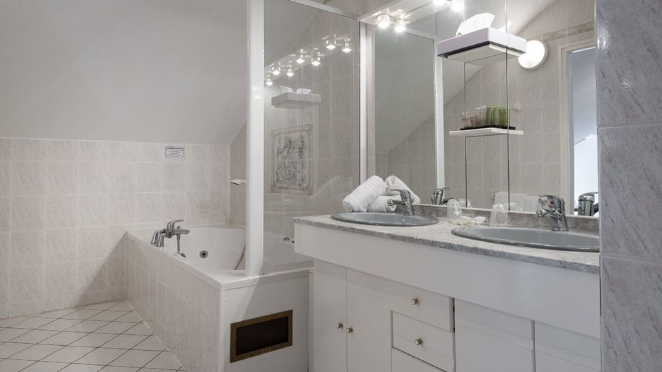 Family Room, Jetted Tub | Bathroom | Free toiletries, hair dryer, towels