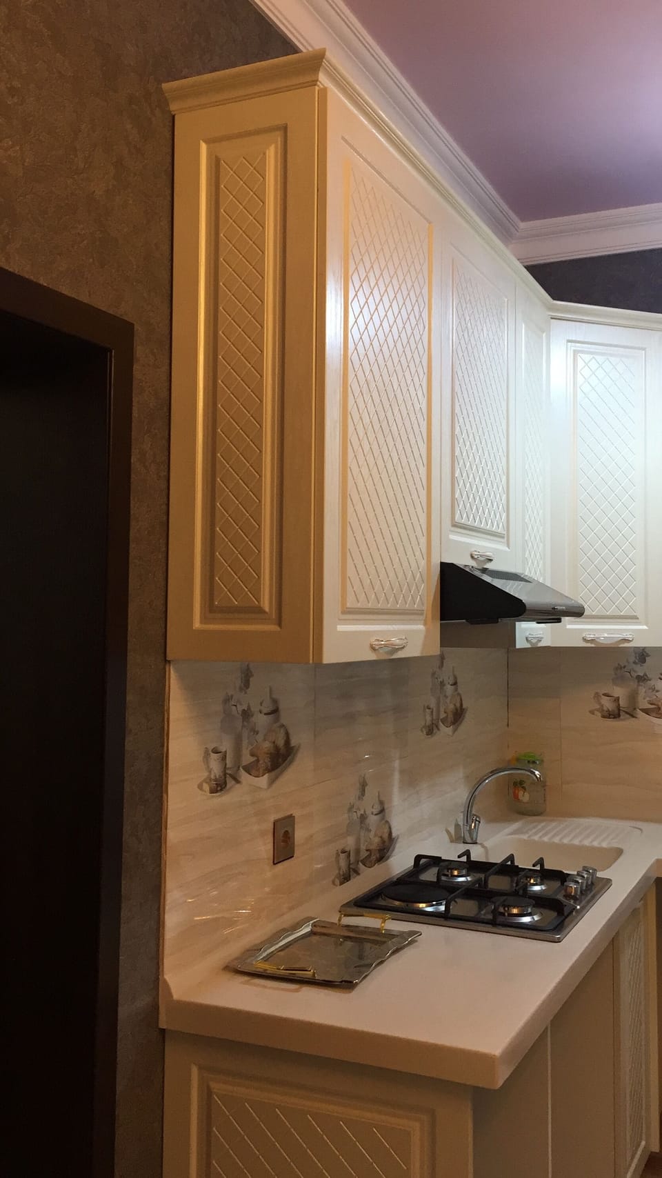 Coffee/tea maker, full-size fridge, shared microwave, oven