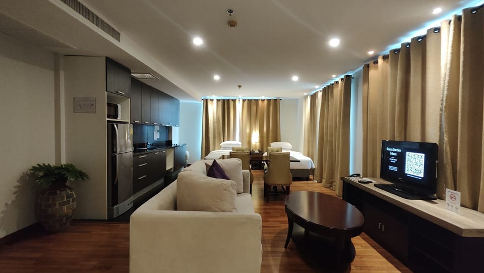 Family 5 People Room | In-room safe, desk, laptop workspace, blackout drapes