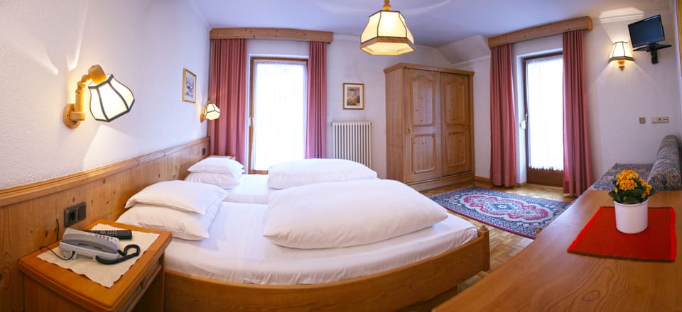 Standard Double Room | Down comforters, in-room safe, desk, blackout drapes
