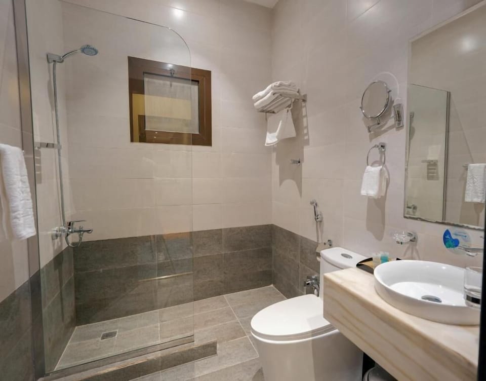 Family Apartment | Bathroom | Hair dryer, slippers, towels, soap