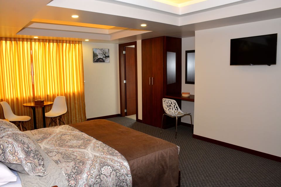 Minibar (free items), desk, laptop workspace, WiFi (free)