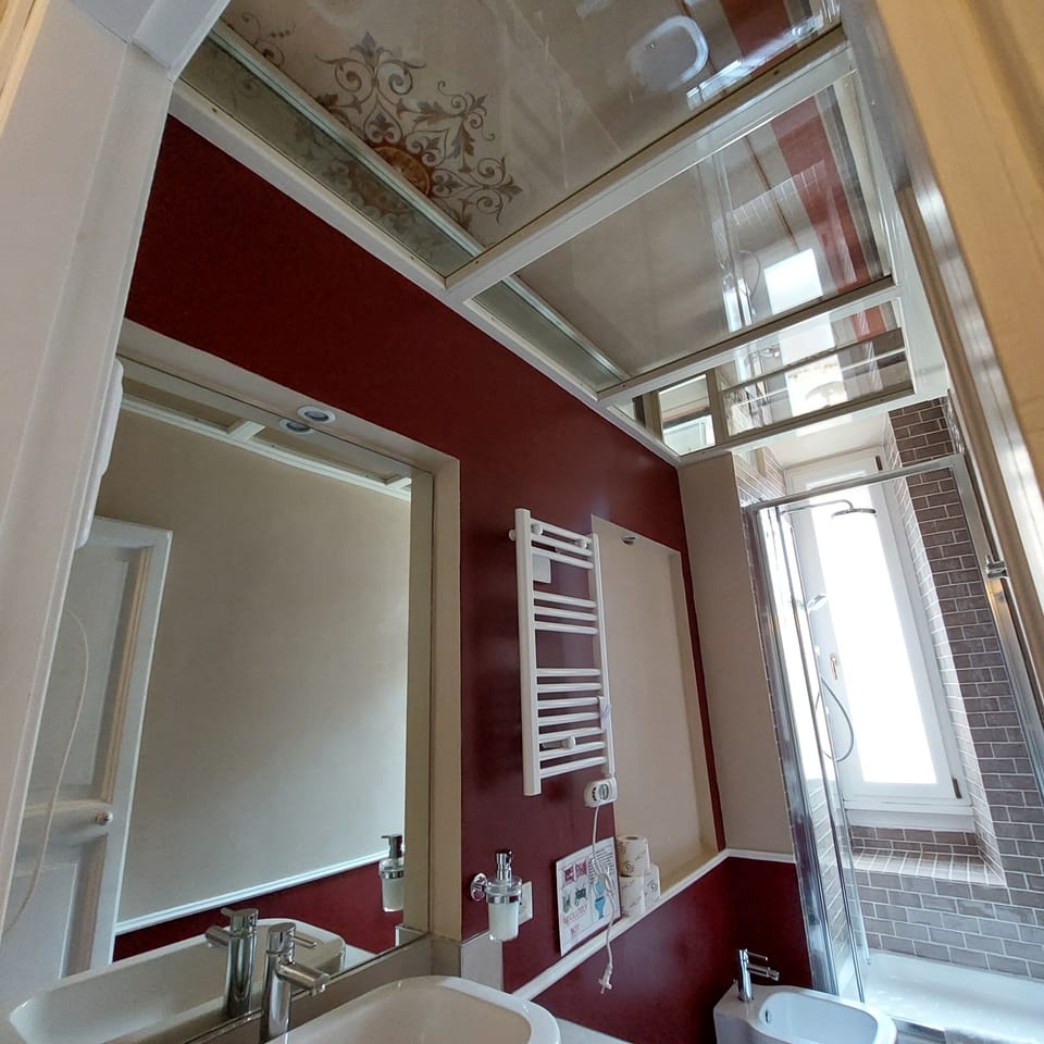 Superior Triple Room, City View (Tango) | Bathroom | Shower, hair dryer, bidet, towels