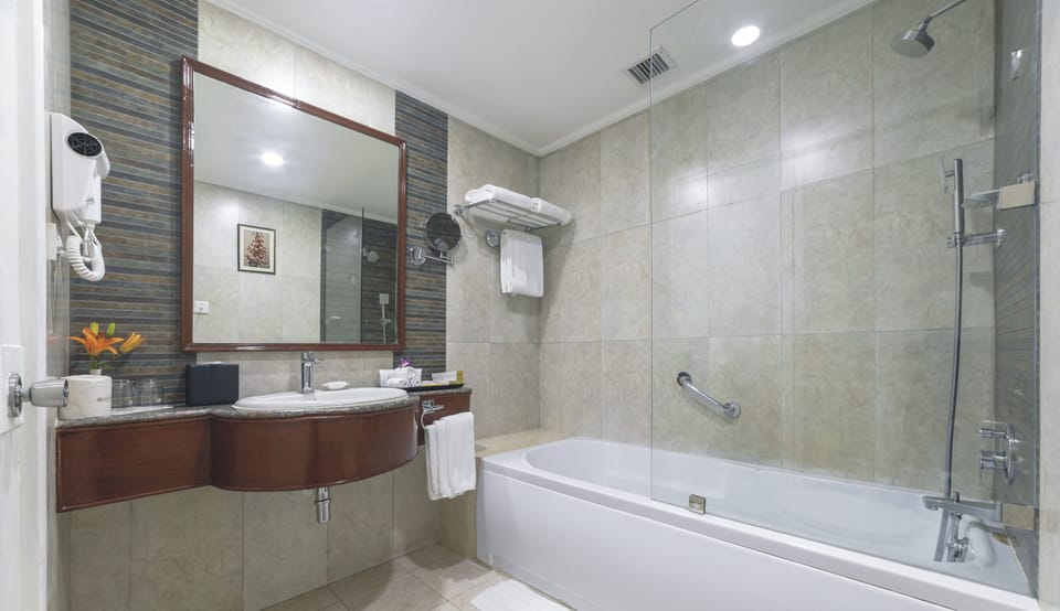 Shiraz Premium | Bathroom | Free toiletries, slippers, towels