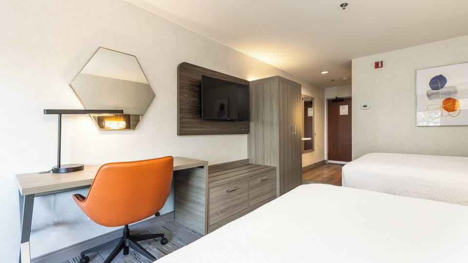 Standard Room, 2 Queen Beds | In-room safe, desk, blackout drapes, iron/ironing board