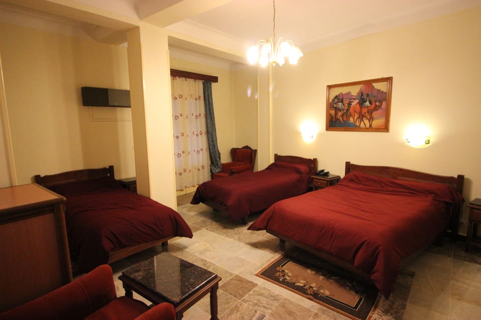 Triple Room | Premium bedding, minibar, in-room safe, desk