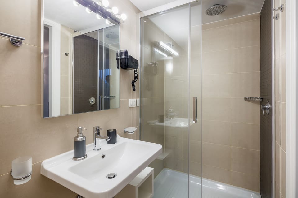 Suite (with Coliseum View) | Premium bedding, down comforters, minibar, in-room safe