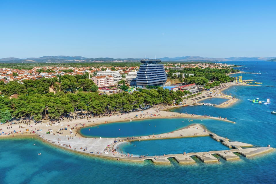 On the beach, sun loungers, beach umbrellas, scuba diving