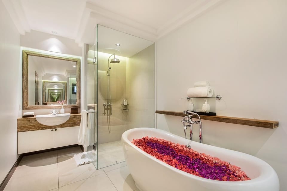 Bathrobes, slippers, bidet, towels
