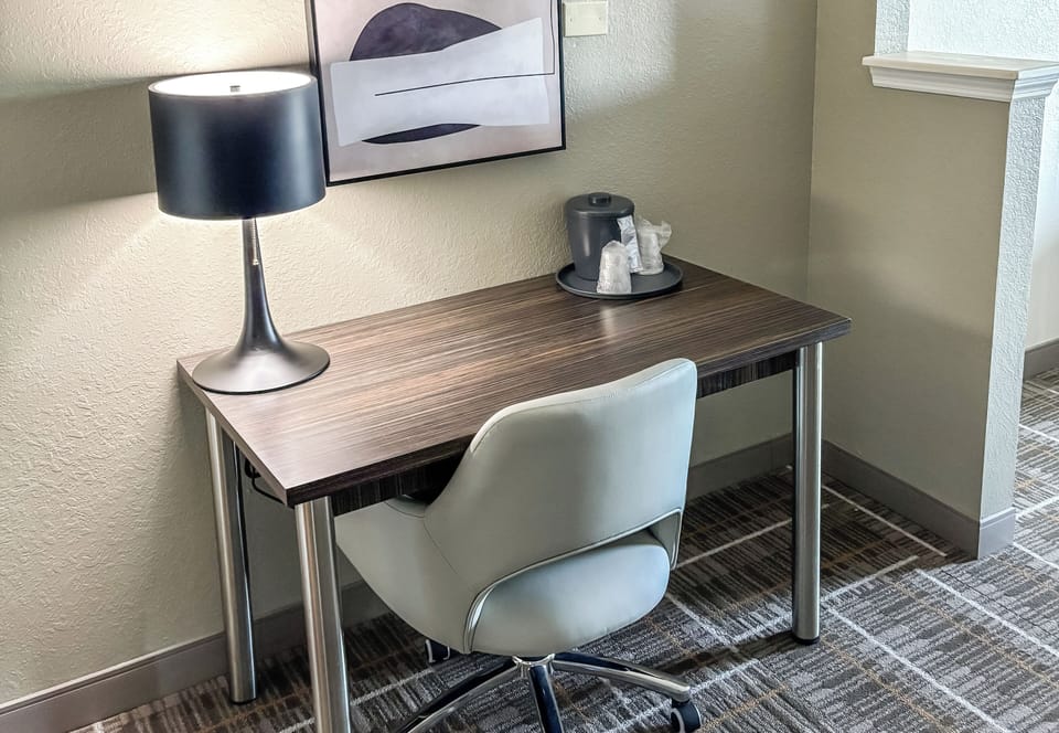 Laptop workspace, blackout drapes, iron/ironing board, cribs/infant beds
