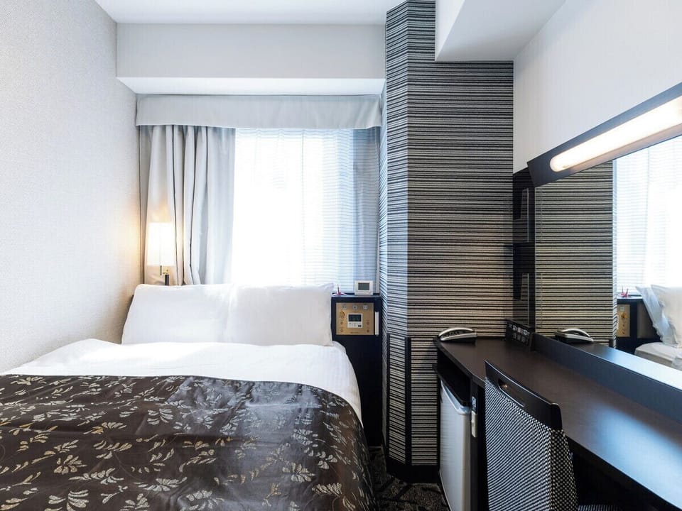 Standard Room with 1bed - Non-Smoking | Down comforters, blackout drapes, iron/ironing board, free WiFi
