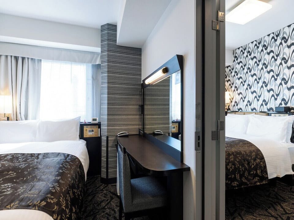 Down comforters, blackout drapes, iron/ironing board, free WiFi