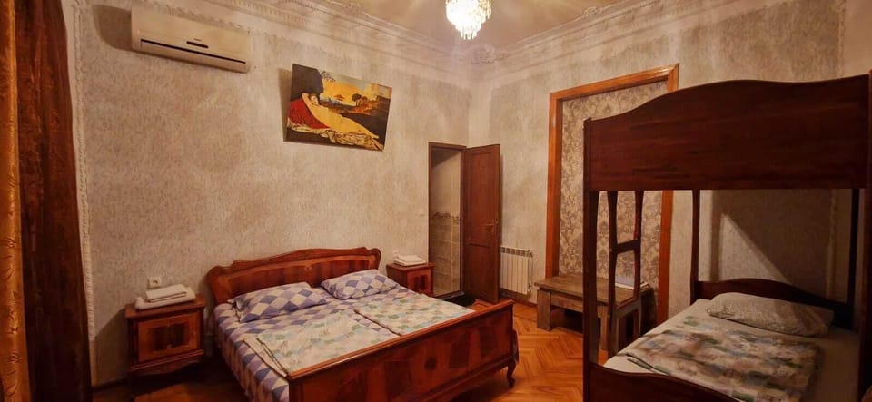 Standard Quadruple Room | Laptop workspace, blackout drapes, soundproofing, iron/ironing board