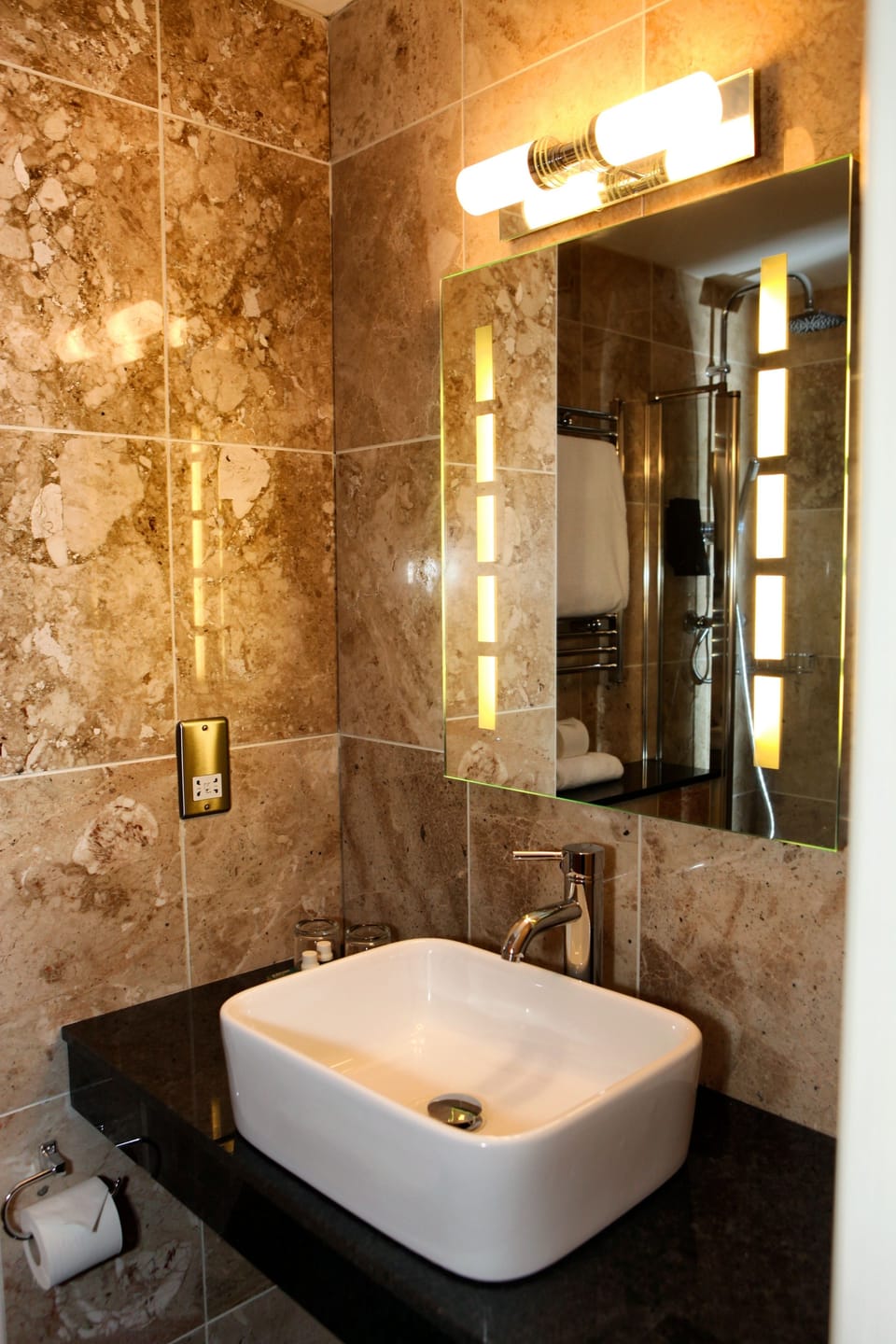 Combined shower/tub, hair dryer, towels, soap