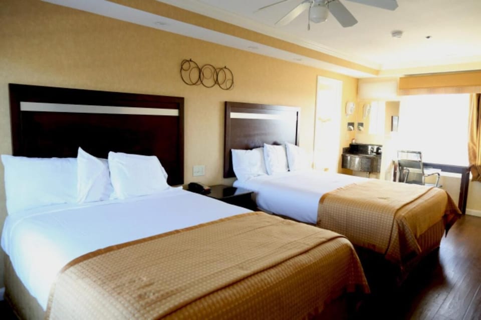 Pillowtop beds, desk, laptop workspace, blackout drapes