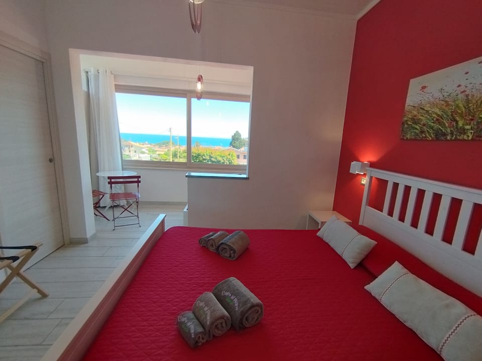 Superior Triple Room | Minibar, in-room safe, desk, blackout drapes