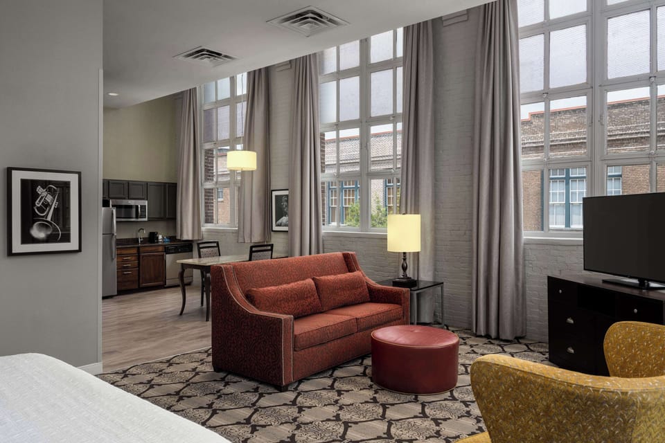 Studio, 1 King Bed, Non Smoking, Kitchen | Living area | 42-inch flat-screen TV with cable channels, TV, iPod dock