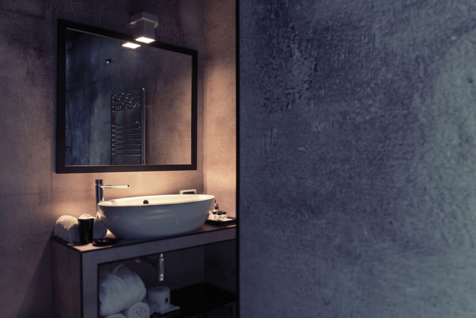 Shower, rainfall showerhead, designer toiletries, hair dryer