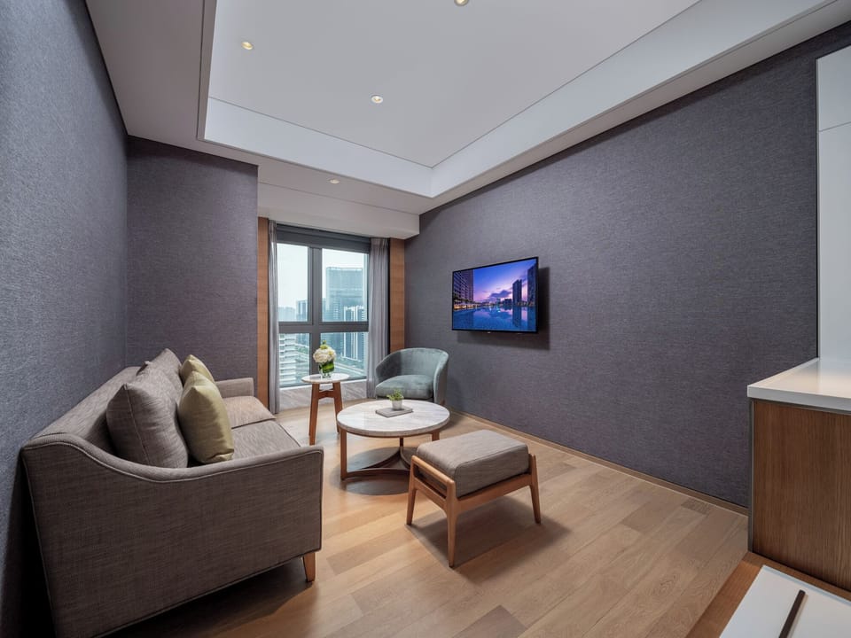 Suite, 1 Bedroom, Non Smoking, City View | In-room safe, desk, blackout drapes, soundproofing