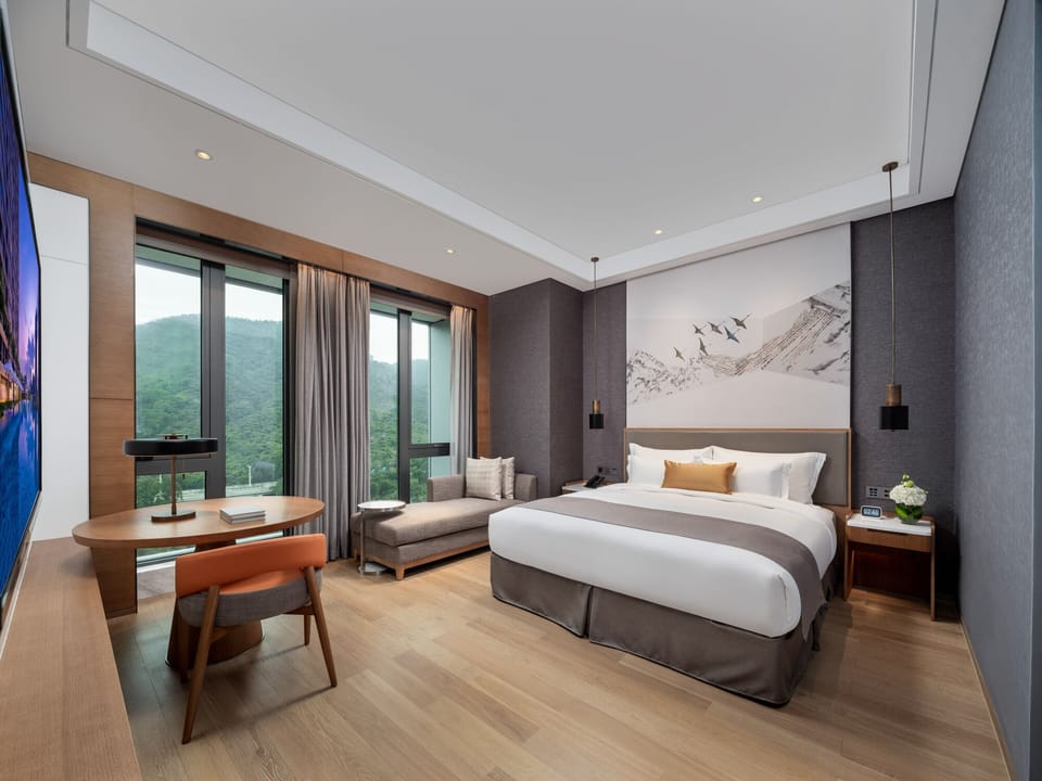 Suite, 1 Bedroom, Non Smoking, City View | In-room safe, desk, blackout drapes, soundproofing