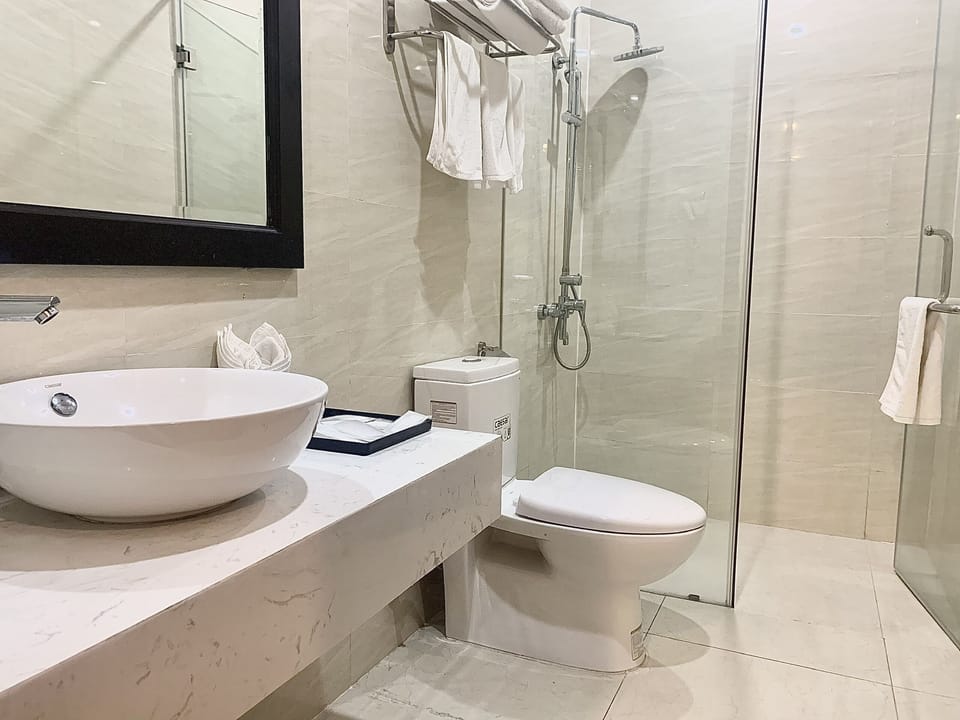 Shower, free toiletries, hair dryer, bathrobes