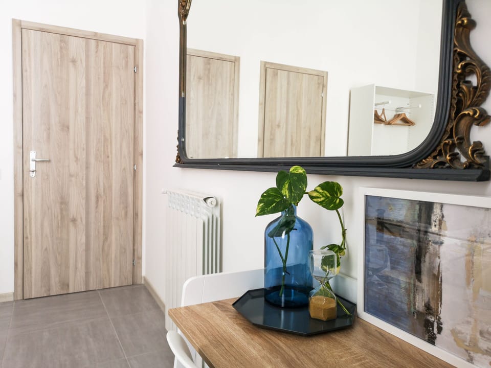 Classic Double Room (4th floor, stair access only) | Living area | Flat-screen TV