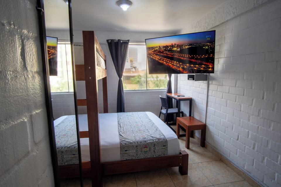 Double Room | Blackout drapes, iron/ironing board, free WiFi, bed sheets