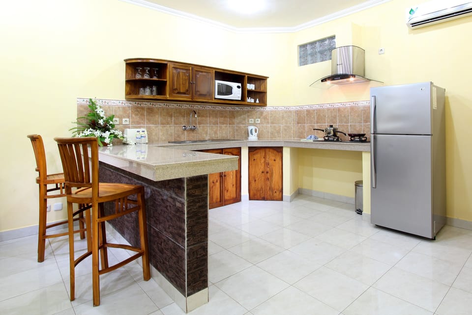 Apartment, 1 Bedroom | Private kitchen | Coffee/tea maker, electric kettle