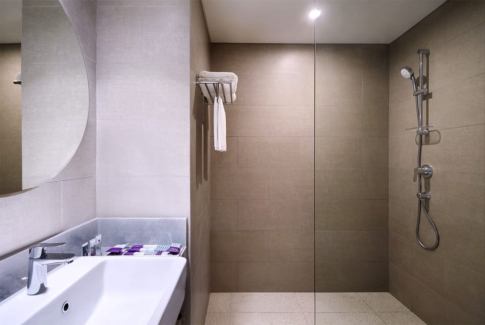 Shower, rainfall showerhead, eco-friendly toiletries, hair dryer