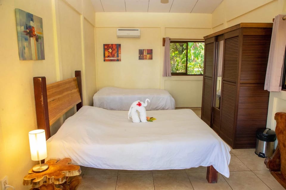 Down comforters, pillowtop beds, in-room safe, desk