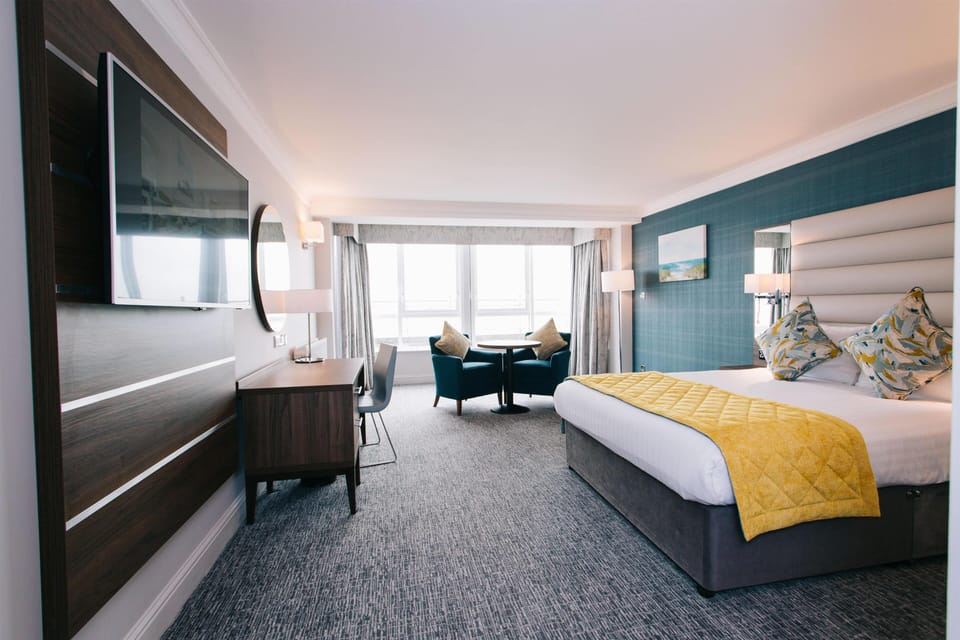 Executive Double Room with a Sea View | In-room safe, desk, laptop workspace, iron/ironing board