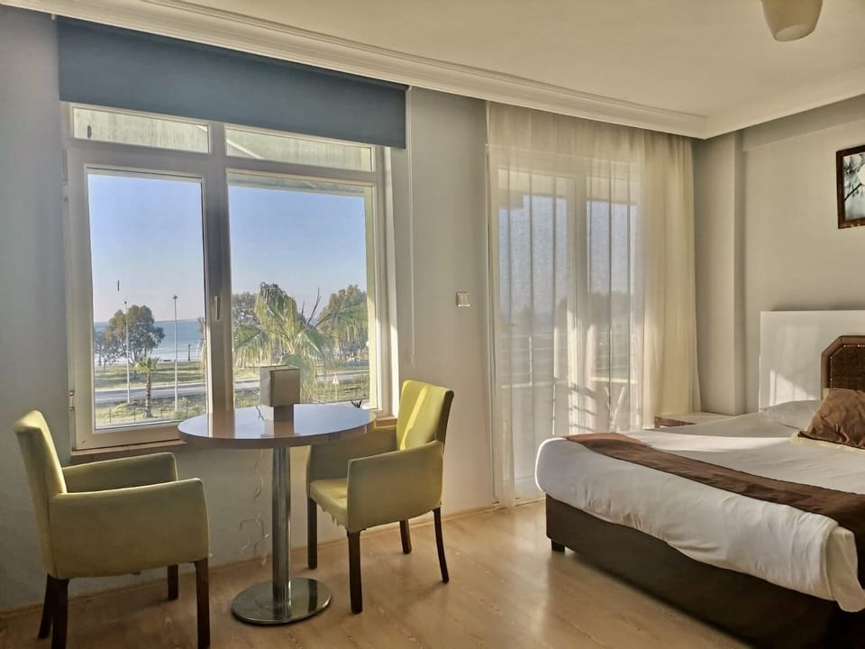 Superior Triple Room | In-room safe, desk, blackout drapes, iron/ironing board