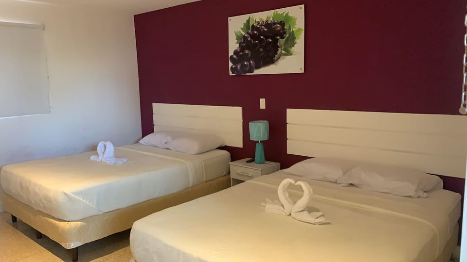 In-room safe, blackout drapes, WiFi (free), bed sheets