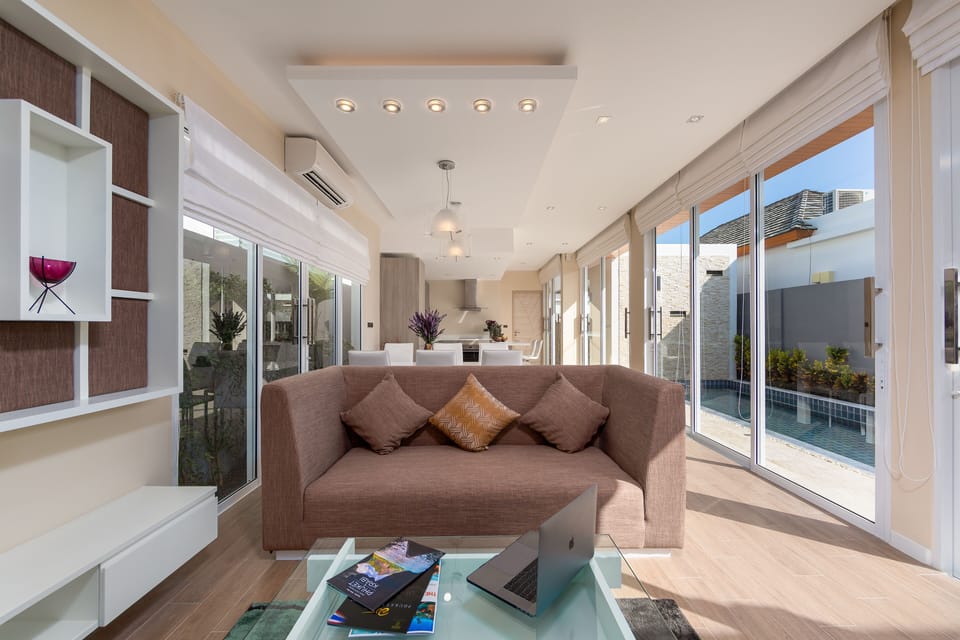 Comfort Villa | Living area | Flat-screen TV