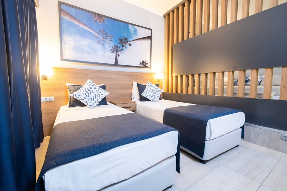 Standard Room, Multiple Beds | In-room safe, desk, WiFi (free), bed sheets