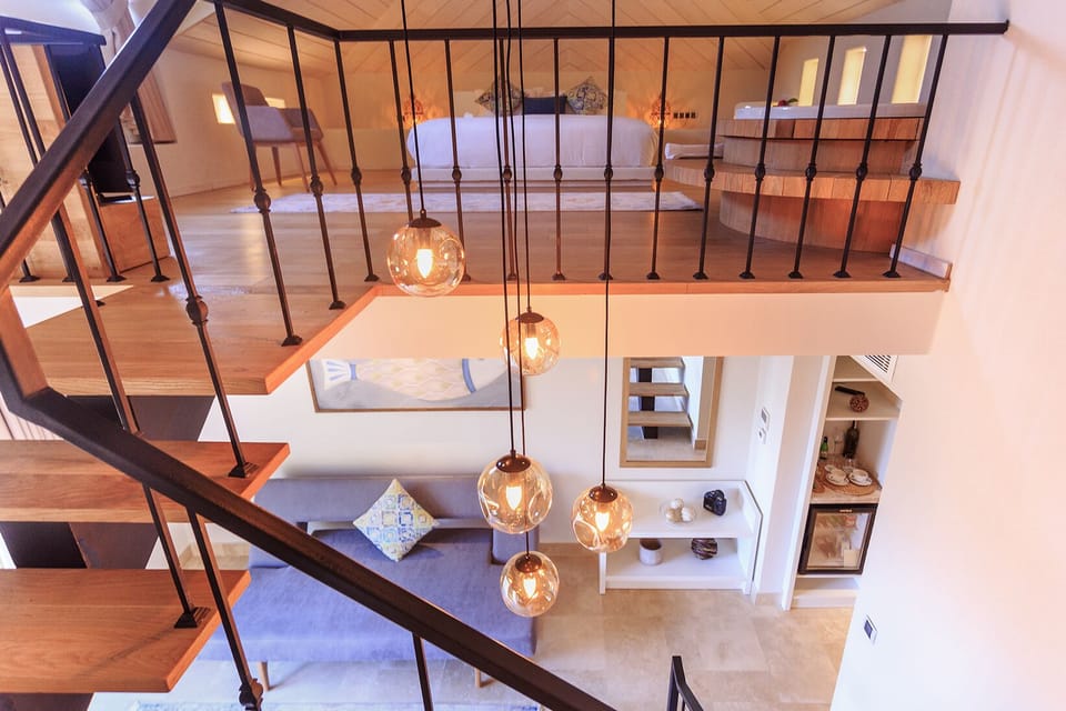 Penthouse Suite | Living area | 32-inch TV with digital channels