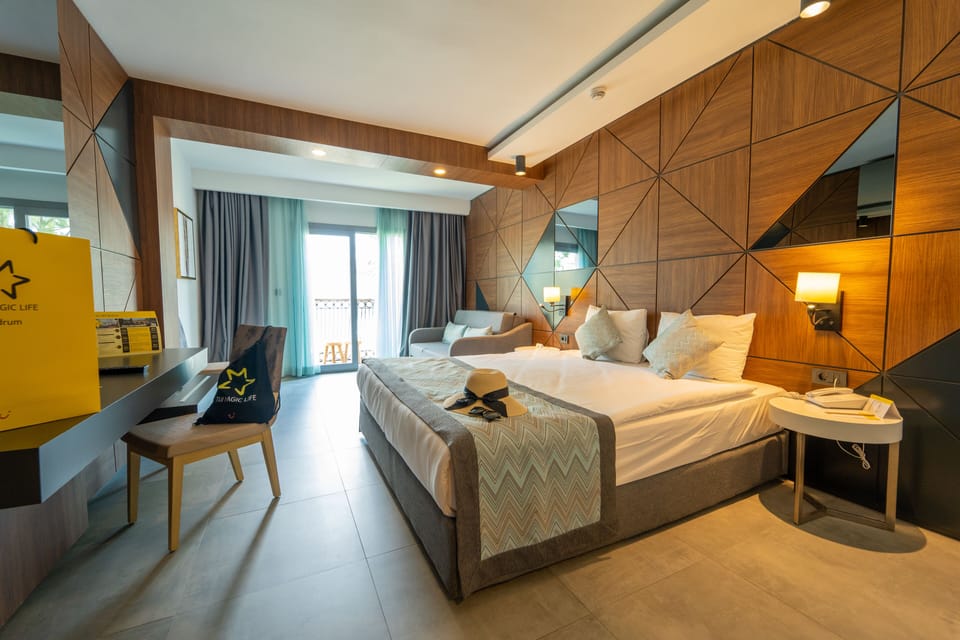 Premium bedding, free minibar items, in-room safe, desk