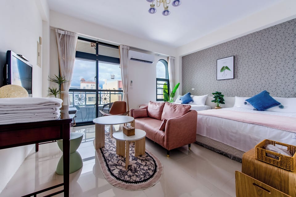 Deluxe Quadruple Room, Balcony | Free WiFi, bed sheets
